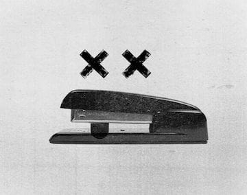 Stapler with two X as the eyes and a falling tongue in black and white with an old fashioned fax print texture.